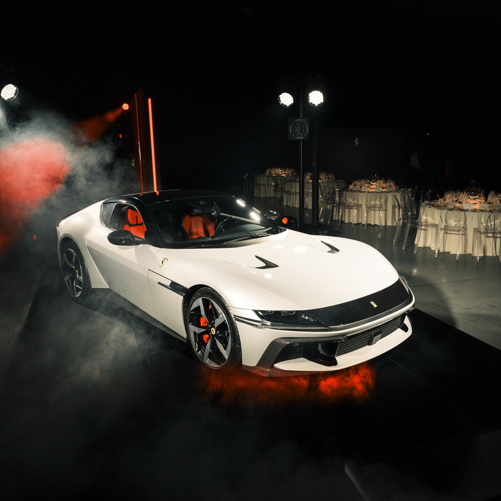 Ferrari 12Cilindri under lights and smoke at its UK launch dinner